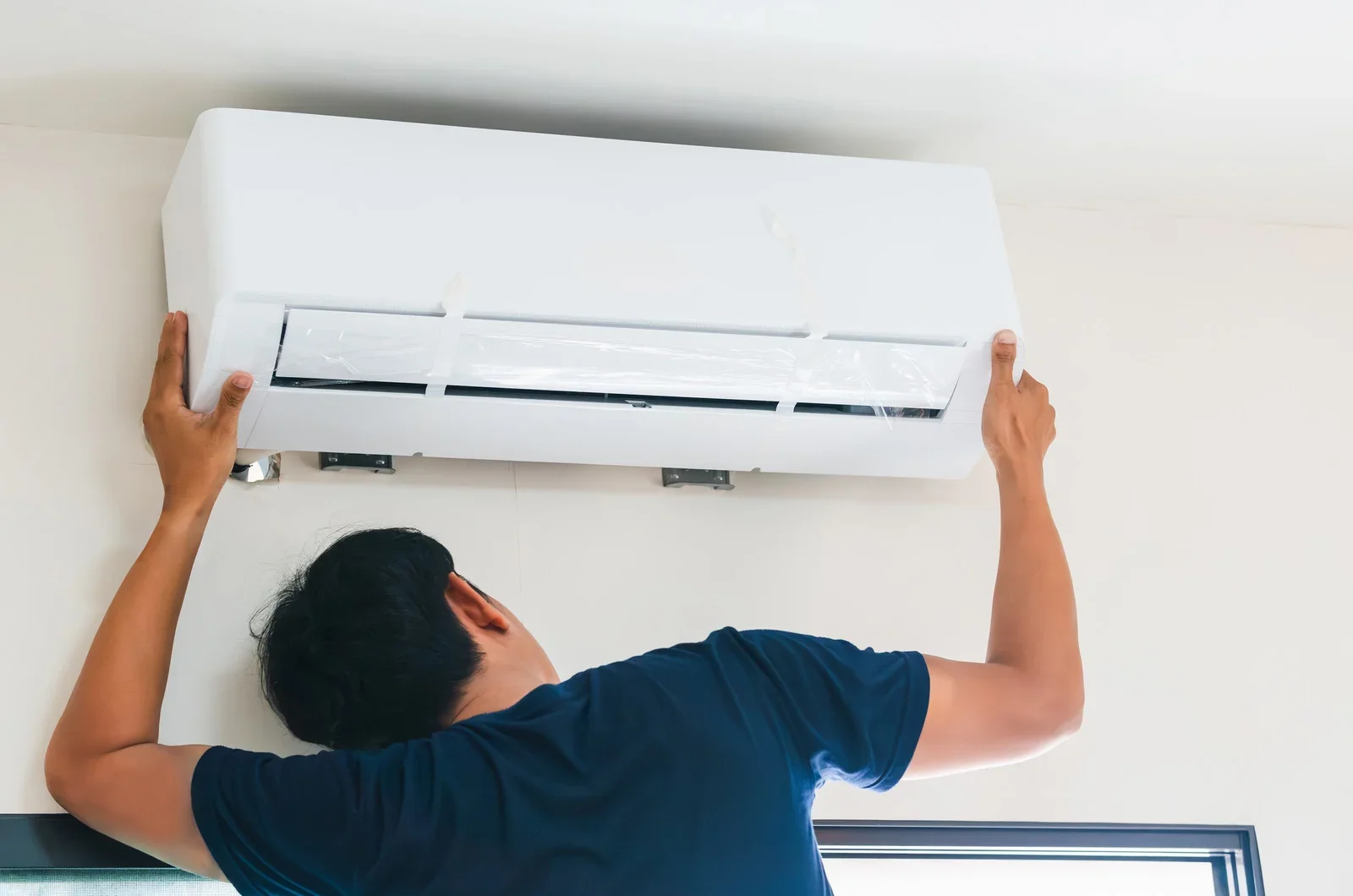 Split system air conditioner installation by an electrician
