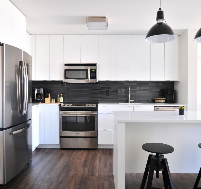 Modern kitchen with pendant lighting and appliance circuits