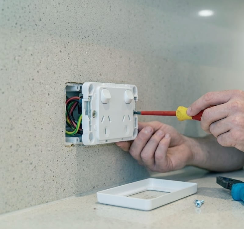HUX electrician installing a new power point in a Gold Coast home